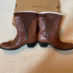 Born tan leather and suede boots.